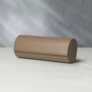 Rome, four-watch roll Four-watch oval-shaped roll in desert taupe Saffiano leather | A Collected Man | Available Worldwide
