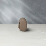 Rome, four-watch roll Four-watch oval-shaped roll in desert taupe Saffiano leather | A Collected Man | Available Worldwide