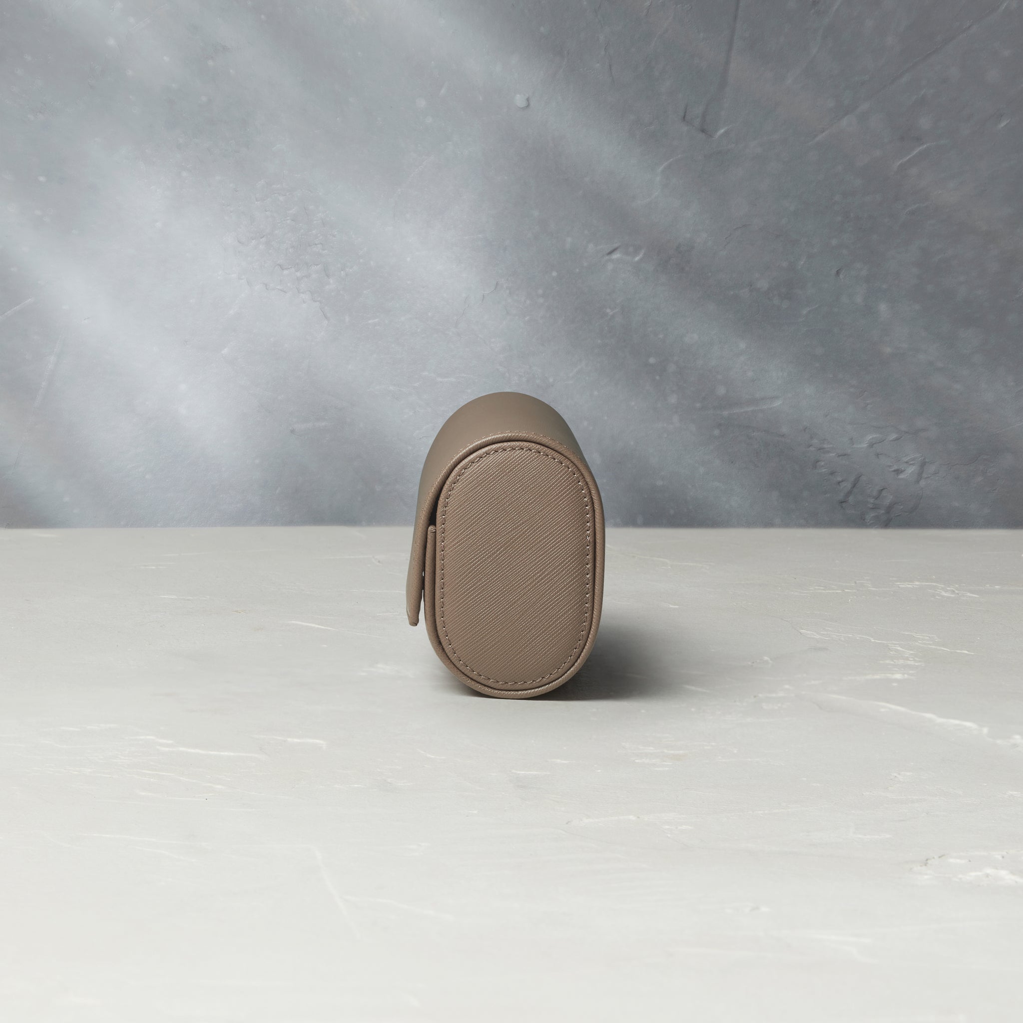 Rome, four-watch roll Four-watch oval-shaped roll in desert taupe Saffiano leather | A Collected Man | Available Worldwide