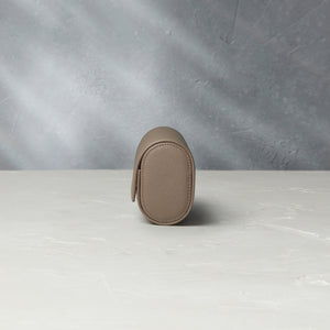 Rome, four-watch roll Four-watch oval-shaped roll in desert taupe Saffiano leather | A Collected Man | Available Worldwide