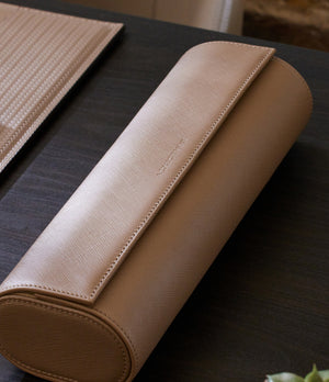 Rome, four-watch roll Four-watch oval-shaped roll in desert taupe Saffiano leather | A Collected Man | Available Worldwide