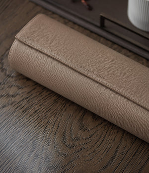 Rome, four-watch roll Four-watch oval-shaped roll in truffle grained leather | Available World Wide | A Collected Man