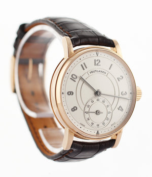 Voutilainen Observatoire  18-carat rose gold manual-winding pre-owned watch with silver dial and brown strap
