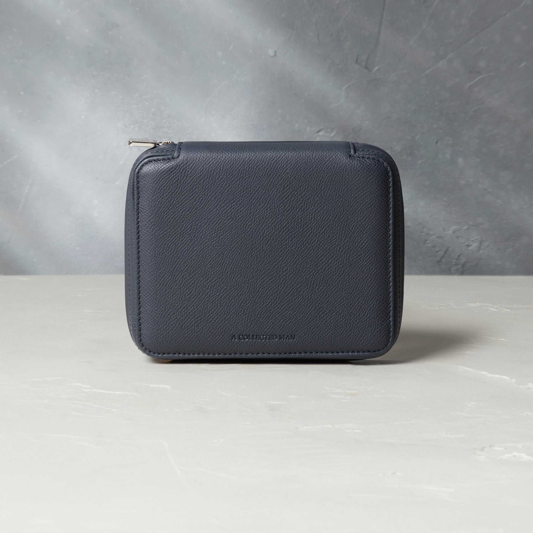 Four-watch slim folio in midnight blue grained leather, Handmade in France by skilled craftsmen from classic, midnight blue grained leather, it’s a slim case with a tactile, natural feel | A Collected Man