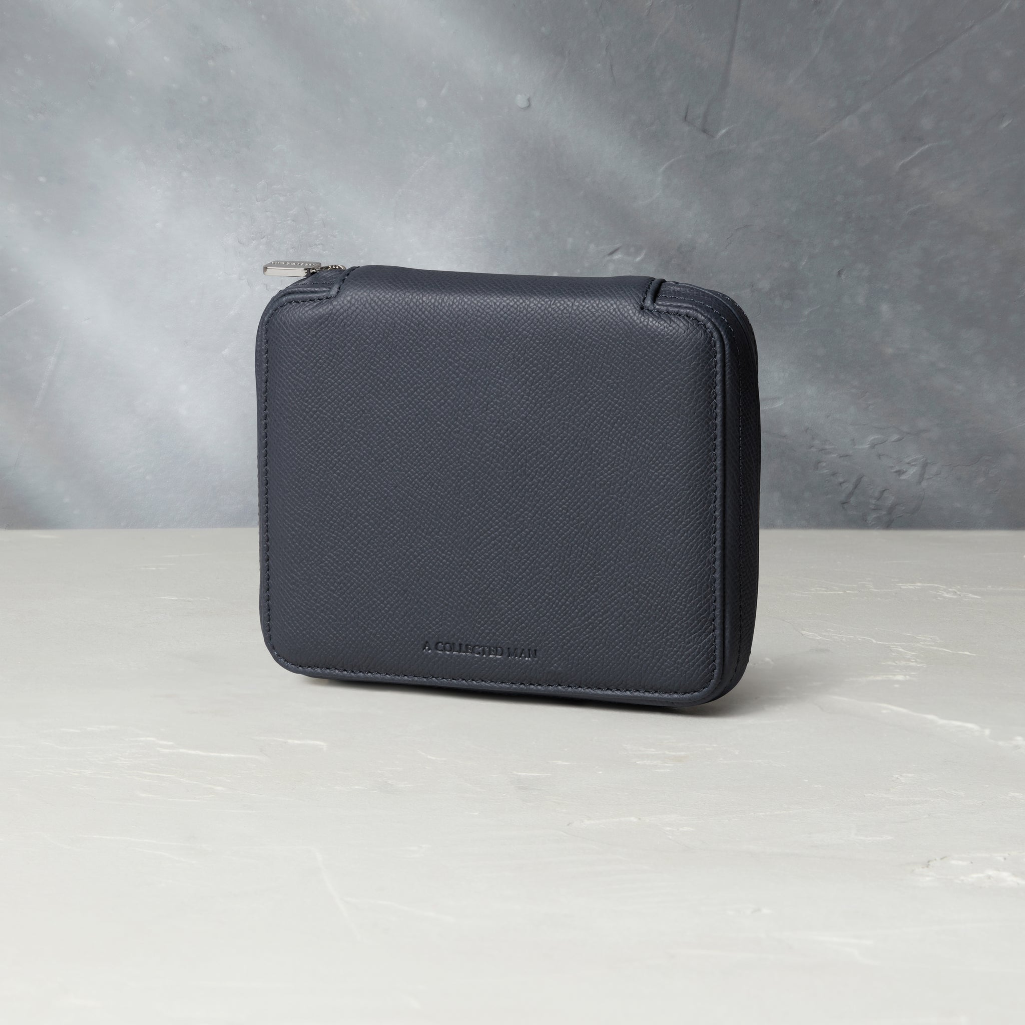 Four-watch slim folio in midnight blue grained leather, Handmade in France by skilled craftsmen from classic, midnight blue grained leather, it’s a slim case with a tactile, natural feel | A Collected Man