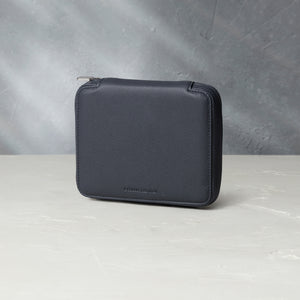 Four-watch slim folio in midnight blue grained leather, Handmade in France by skilled craftsmen from classic, midnight blue grained leather, it’s a slim case with a tactile, natural feel | A Collected Man