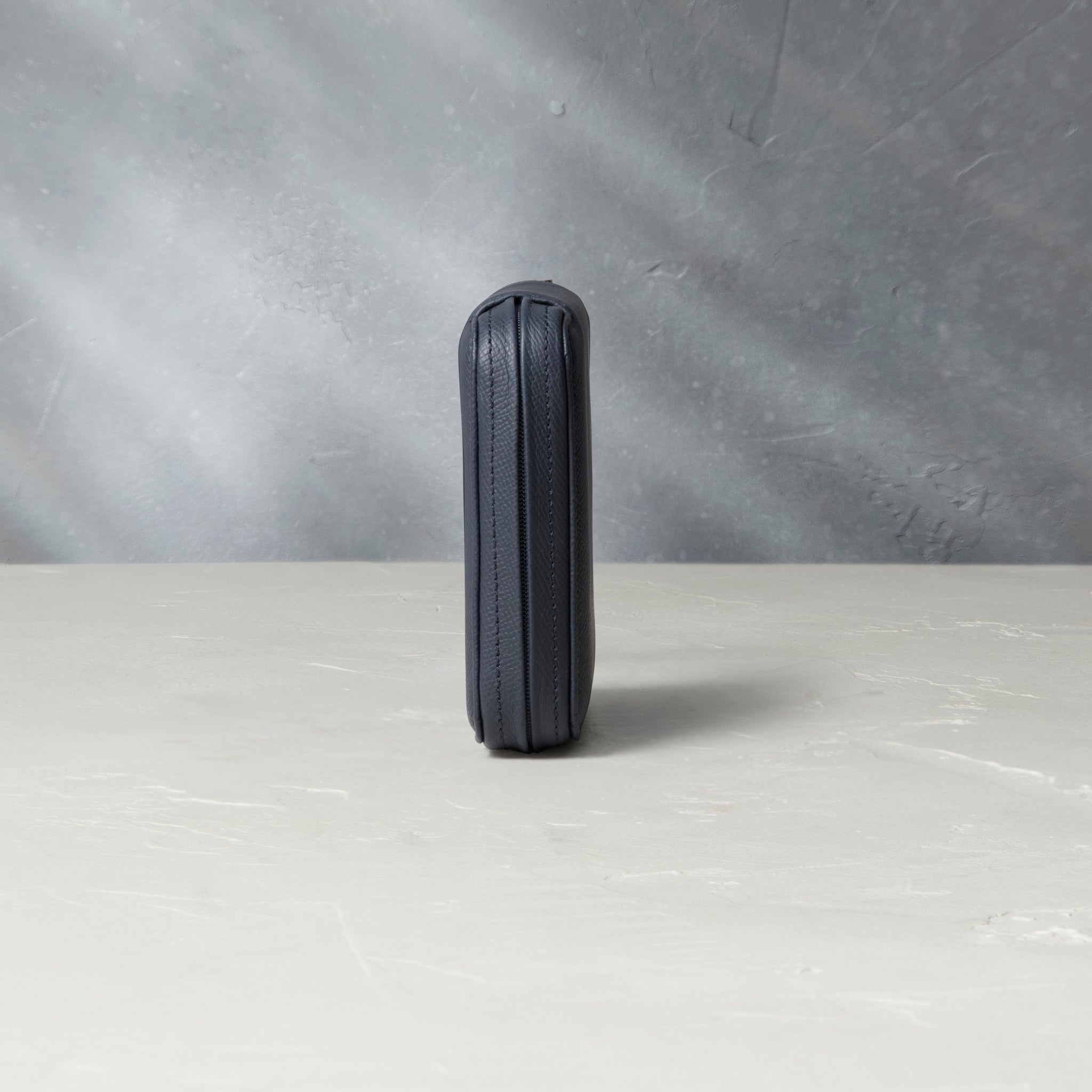 Four-watch slim folio in midnight blue grained leather, Handmade in France by skilled craftsmen from classic, midnight blue grained leather, it’s a slim case with a tactile, natural feel | A Collected Man