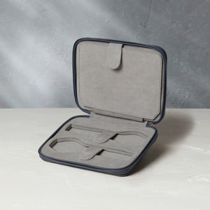 Four-watch slim folio in midnight blue grained leather, Handmade in France by skilled craftsmen from classic, midnight blue grained leather, it’s a slim case with a tactile, natural feel | A Collected Man