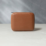 Zurich, four-watch folio Four-watch slim folio in whisky-tan Saffiano leather | Available Worldwide | A Collected Man