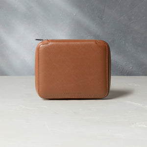 Zurich, four-watch folio Four-watch slim folio in whisky-tan Saffiano leather | Available Worldwide | A Collected Man