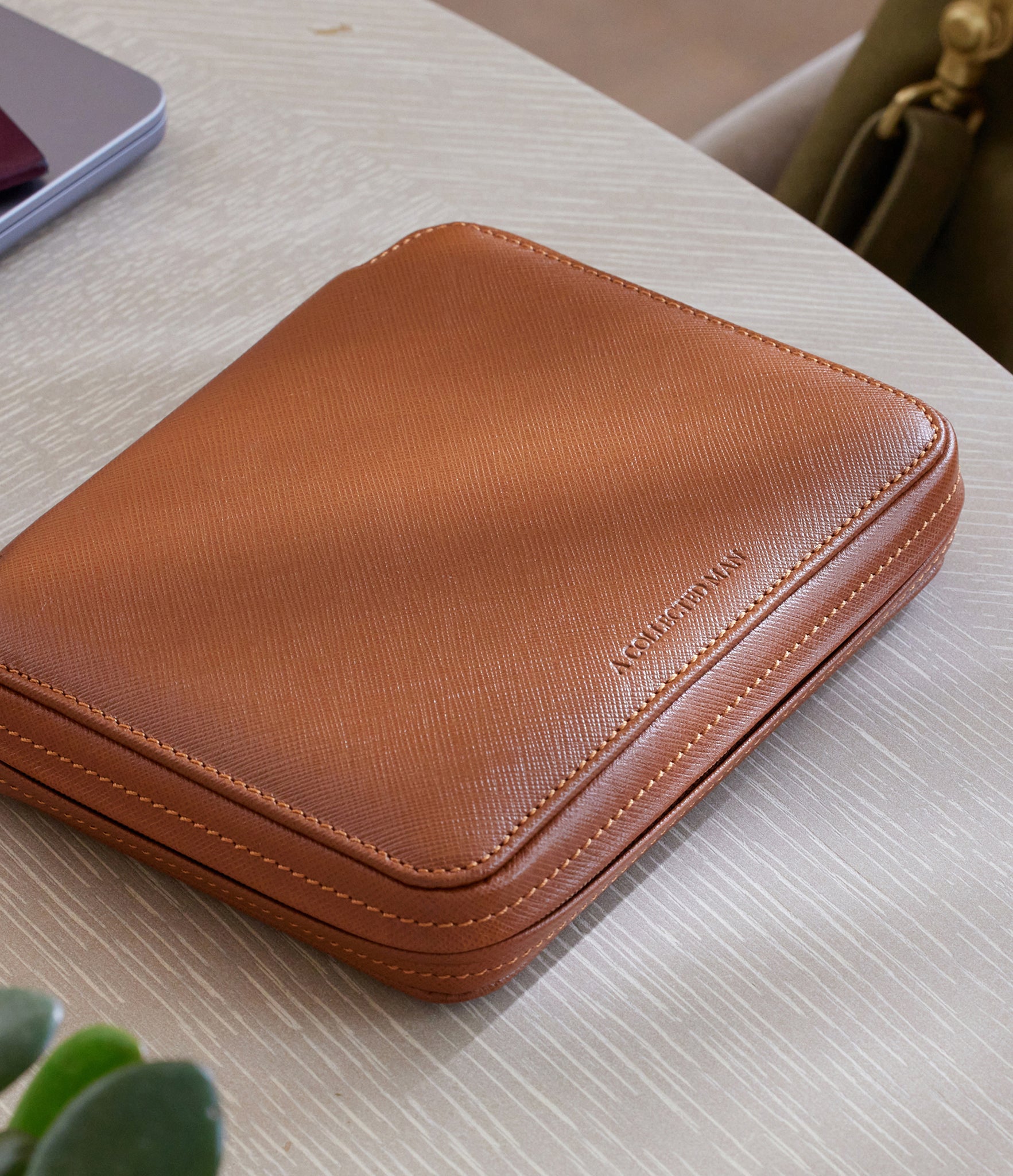 Zurich, four-watch folio Four-watch slim folio in whisky-tan Saffiano leather | Available World Wide | A Collected Man