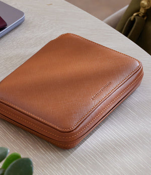 Zurich, four-watch folio Four-watch slim folio in whisky-tan Saffiano leather | Available World Wide | A Collected Man