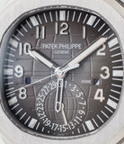 buy Patek Philippe Aquanaut Travel-time 5164A-001 steel pre-owned traveller automatic watch black dial dual time zone with box and papers for sale at WATCH XCHANGE London authenticity guaranteed