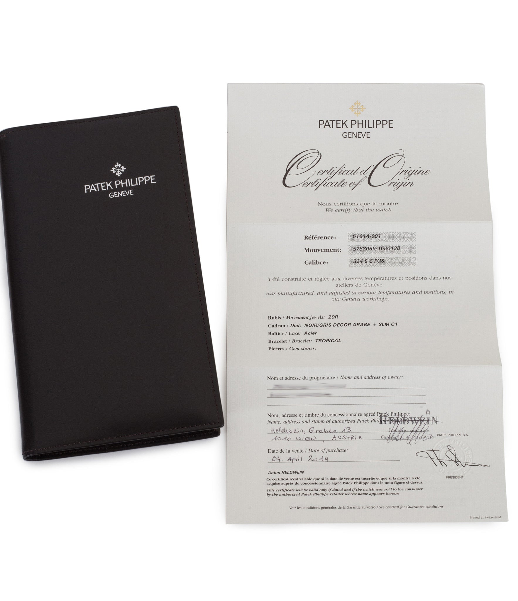 buy Patek Philippe Aquanaut Travel-time 5164A-001 steel pre-owned traveller automatic watch black dial dual time zone with box and papers for sale at WATCH XCHANGE London authenticity guaranteed