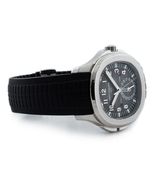 buy Patek Philippe Aquanaut Travel-time 5164A-001 steel pre-owned traveller automatic watch black dial dual time zone with box and papers for sale at WATCH XCHANGE London authenticity guaranteed