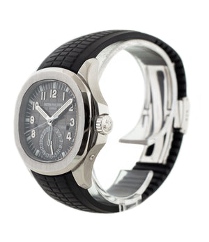 buy Patek Philippe Aquanaut Travel-time 5164A-001 steel pre-owned traveller automatic watch black dial dual time zone with box and papers for sale at WATCH XCHANGE London authenticity guaranteed