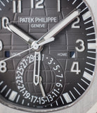 buy Patek Philippe Aquanaut Travel-time 5164A-001 steel pre-owned traveller automatic watch black dial dual time zone with box and papers for sale at WATCH XCHANGE London authenticity guaranteed