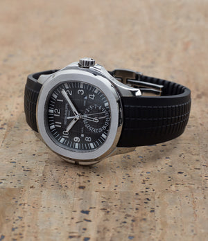 buy Patek Philippe Aquanaut Travel-time 5164A-001 steel pre-owned traveller automatic watch black dial dual time zone with box and papers for sale at WATCH XCHANGE London authenticity guaranteed