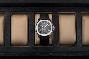 buy Patek Philippe Aquanaut Travel-time 5164A-001 steel pre-owned traveller automatic watch black dial dual time zone with box and papers for sale at WATCH XCHANGE London authenticity guaranteed