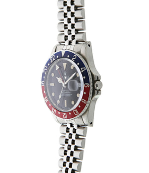 buy Rolex GMT Master with Tiffany dial 16750 stainless steel automatic Cal. 3075 vintage authentic pre-owned dress, sport luxury watch from 1984 with black dial and stainless steel Rolex bracelet with date, chronometer, gmt, hours, minutes, center seconds