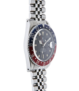 buy Rolex GMT Master with Tiffany dial 16750 stainless steel automatic Cal. 3075 vintage authentic pre-owned dress, sport luxury watch from 1984 with black dial and stainless steel Rolex bracelet with date, chronometer, gmt, hours, minutes, center seconds