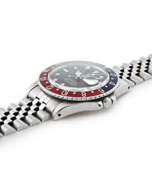 buy Rolex GMT Master with Tiffany dial 16750 stainless steel automatic Cal. 3075 vintage authentic pre-owned dress, sport luxury watch from 1984 with black dial and stainless steel Rolex bracelet with date, chronometer, gmt, hours, minutes, center seconds
