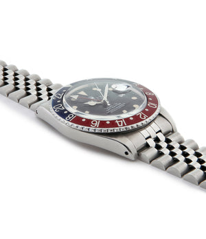 buy Rolex GMT Master with Tiffany dial 16750 stainless steel automatic Cal. 3075 vintage authentic pre-owned dress, sport luxury watch from 1984 with black dial and stainless steel Rolex bracelet with date, chronometer, gmt, hours, minutes, center seconds