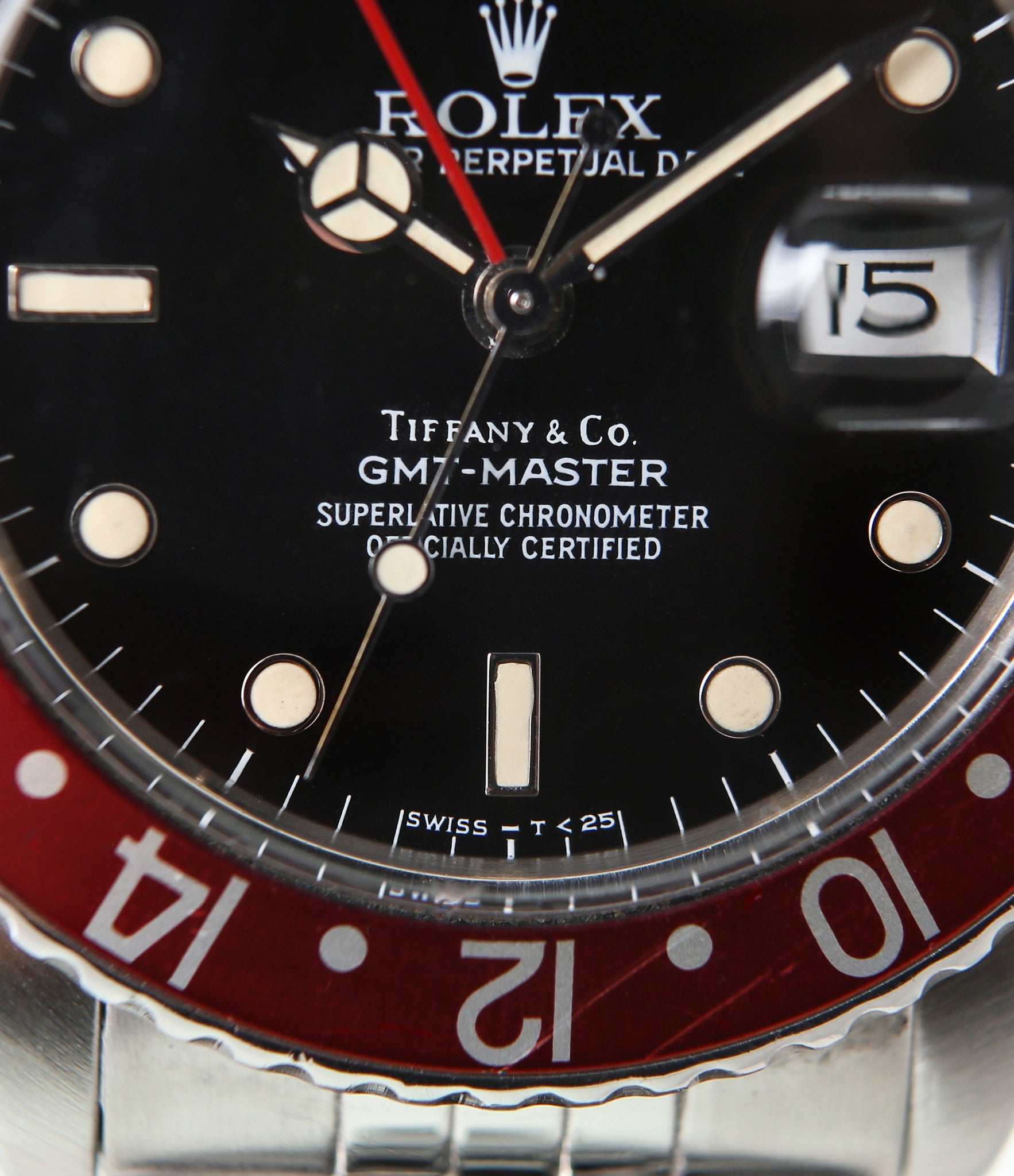 buy Rolex GMT Master with Tiffany dial 16750 stainless steel automatic Cal. 3075 vintage authentic pre-owned dress, sport luxury watch from 1984 with black dial and stainless steel Rolex bracelet with date, chronometer, gmt, hours, minutes, center seconds