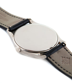 buy Patek Philippe Calatrava 5196G-001 18-carat white gold manual-winding pre-owned watch with silver dial and black strap