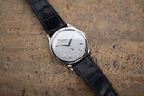 buy pre-owned Patek Philippe Calatrava 5196G-001 18-carat white gold manual-winding pre-owned watch with silver dial and black strap