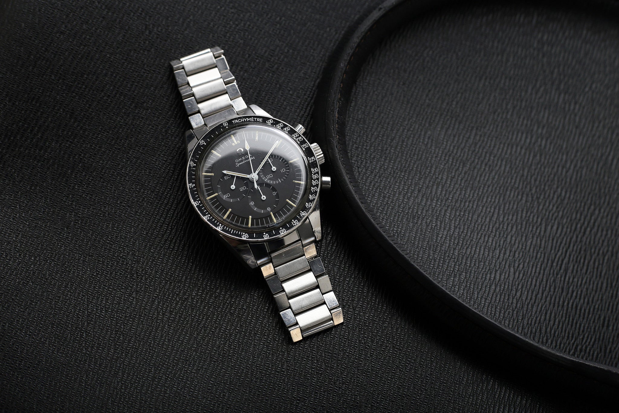 buy vintage Omega Speedmaster Pre-Professional Ed White ST 105.003-65 steel Cal. 321 manual-winding column-wheel chronograph watch with archive extracts for sale at WATCH XCHANGE London